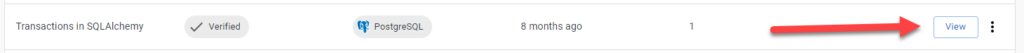 A row on the custom database page with an arrow pointing to the "view" button.